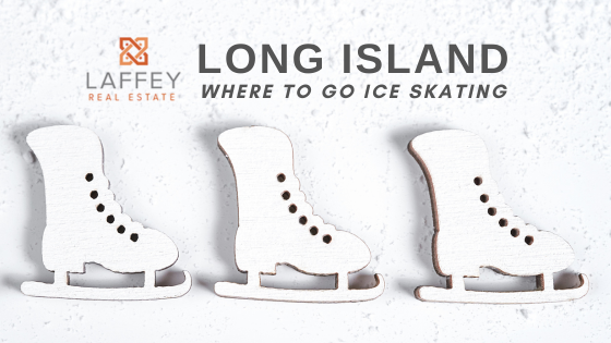 White ice figure skates shoes hanging on the brick wall. stock photo